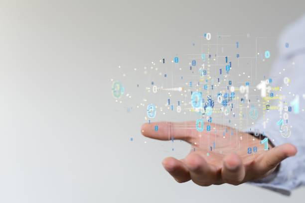 istock Person with his hand out towards 3D rendered binary code  - concept of technology 1454768866