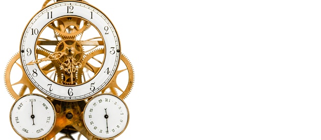 The vintage antique clock with golden gears isolated on white background with a copyspace for an advertisement text