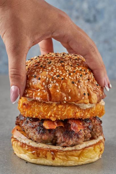 Chickenburger with crunchy bun topped with sesame