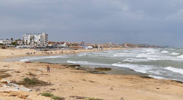 istock Empty beach in La Mata, Torrevieja, Costa Blanca, Spain during sunset 1454772821