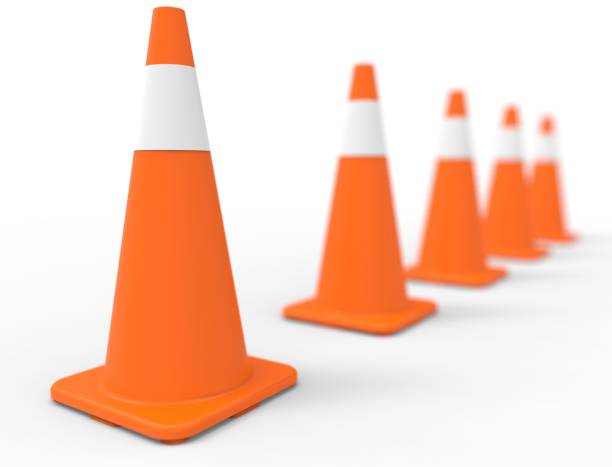 istock 3D rendering of orange traffic cones isolated on white background 1454774162