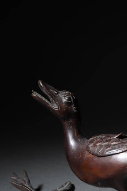 istock Vertical shot of an ancient Chinese bronze statue 1454774396