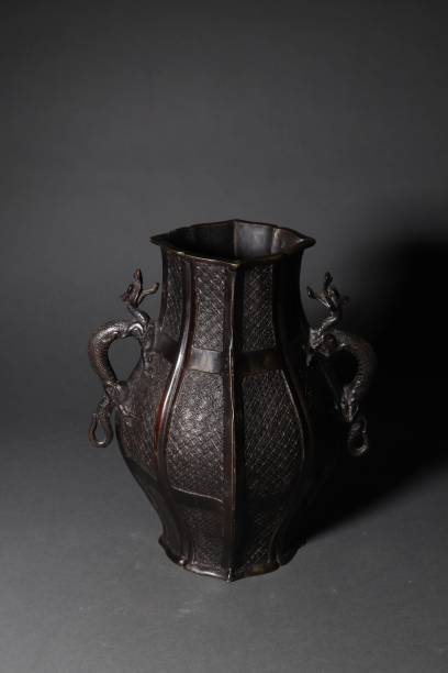 istock Vertical shot of an ancient Chinese bronze pot 1454774397