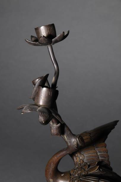 istock Vertical shot of a Chinese ancient traditional decoration on a grey background 1454774549