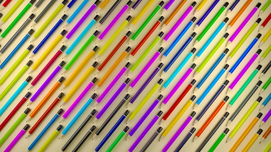 A set of colored pencils in a pattern