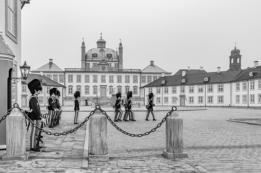 Fredensborg, Denmark – May 18, 2019: A grayscale shot of the Frederiksborg Castle, Hillerod, Denmark