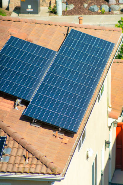 istock House with solar panels on its roof 1454780408