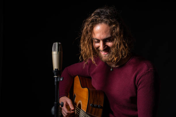 istock Caucasian musician playing guitar in Spain 1454782524