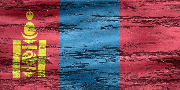The Mongolia flag painted on a wooden surface