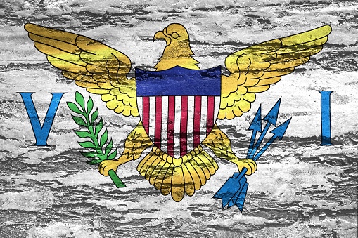 An illustration of the Virgin Islands flag on a concrete background