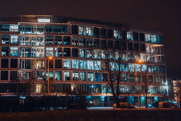 Black and white illuminated building - night city view