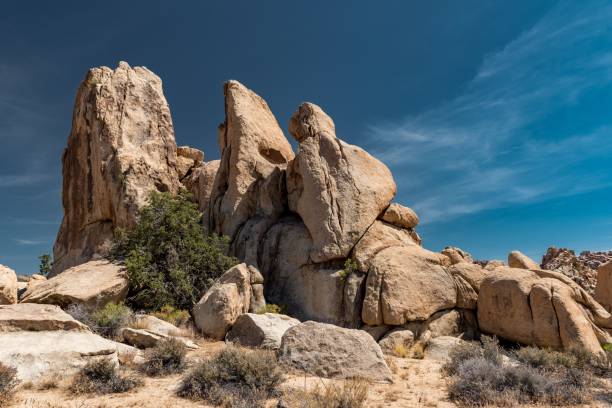 istock Beautiful stark desert landscape with rugged rock formations on a sunny day 1454785641
