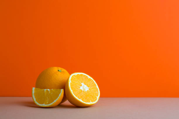 istock A front view of citrus in orange background 1454786567