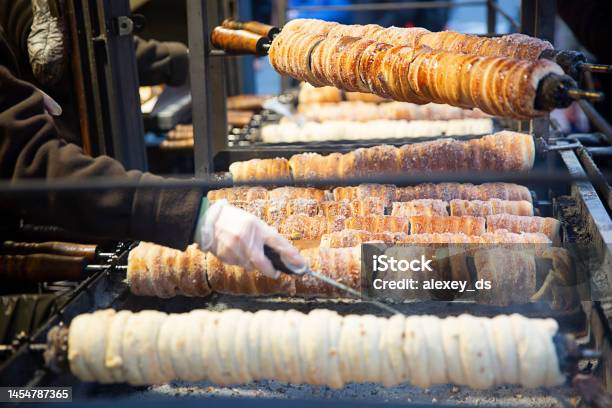 Process Of Cooking A Trdelnik The National Czech Delicacy Stock Photo - Download Image Now