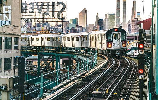 New York, United States – February 19, 2022: The number 7 train entering into Queensboro Plaza in New York City, USA