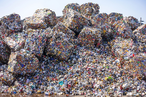 A pile of used beverage cans piled up on a landfill in Asahi, a supposedly industrial area in Takamatsu, Kagawa Prefecture, on a sunny day in March 2022.