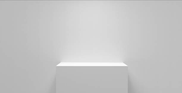 istock 3D illustration of white cube pedestal in a minimal background 1454789791