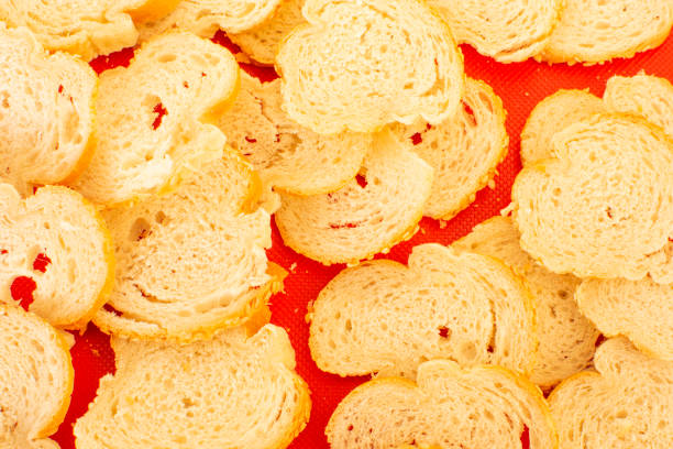 Old light pieces of dry bread. Dried bread slices.
