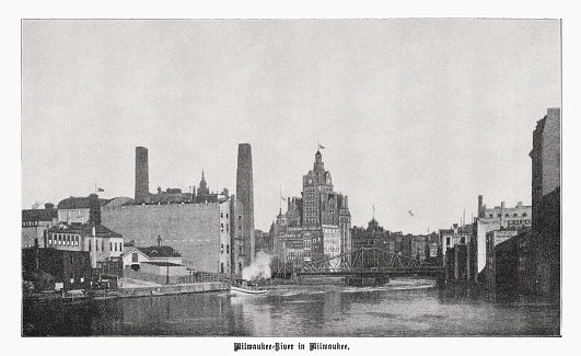 Historical view of the Milwaukee River in Milwaukee, Wisconsin, USA. Halftone print after a photograph, published in 1899.