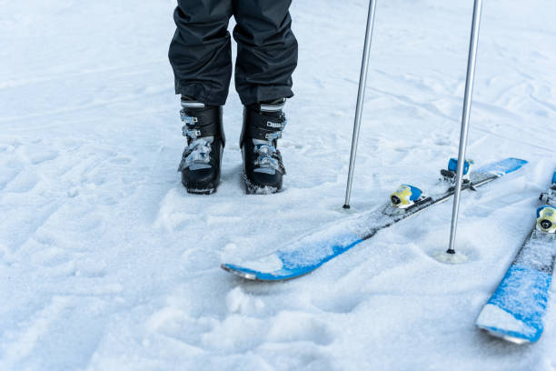 istock A man with the ski equipment in the snow. 1454796735