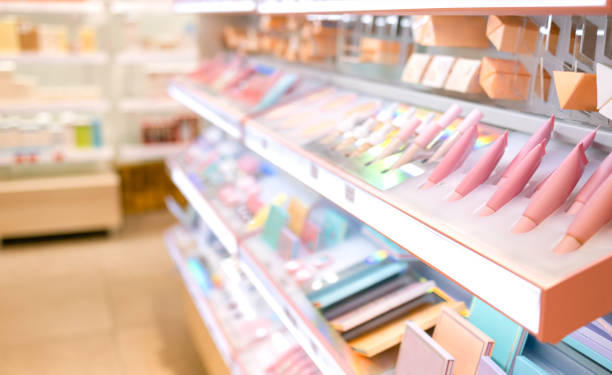 istock Shelves with makeup products in a cosmetics store indoor 1454800141