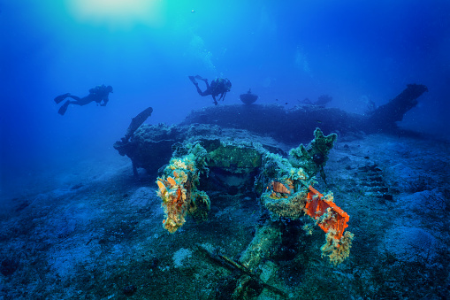 Underwater scene. Underwater wreck. Sunken ship, Scuba diving. Exploration. Adventure.