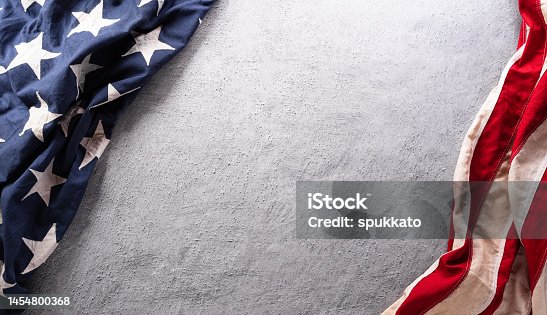 istock Happy Presidents day concept made from American flag and on dark stone background. 1454800368