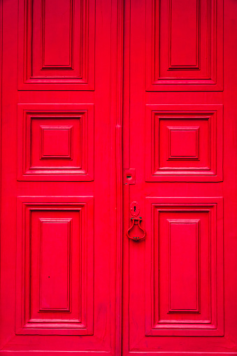 Red painted wooden double door