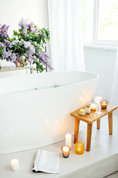 istock Modern bath room and spa center on the white tub wooden table 1454802430
