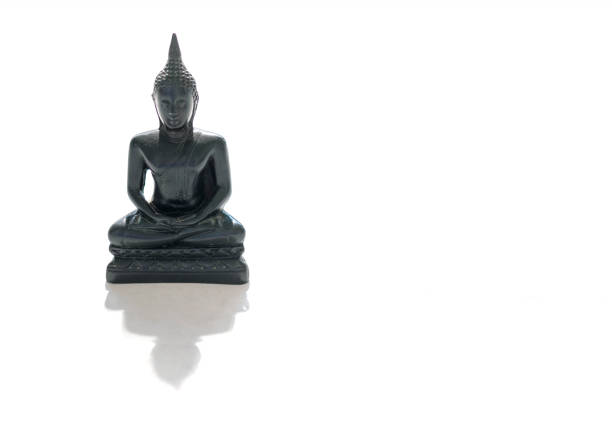 Black stone Buddha Figure Isolated On White background