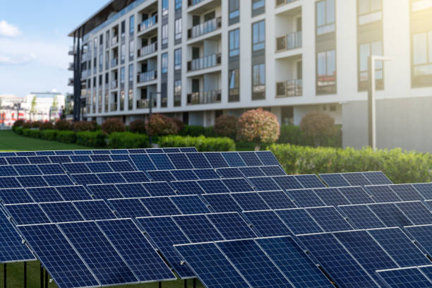 istock Solar panels near building 1454804097