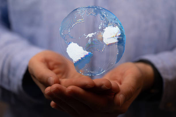 istock Photo of 3d rendered earth floating over man hands 1454804114