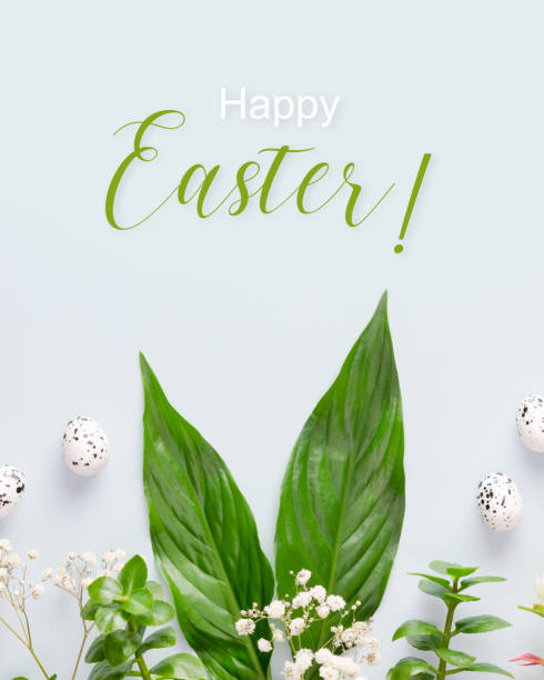 istock Easter holiday card with green leaves, flowers and eggs 1454807901
