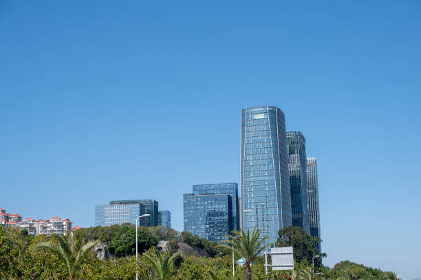 istock Modern high-rise buildings in sunny day 1454808612