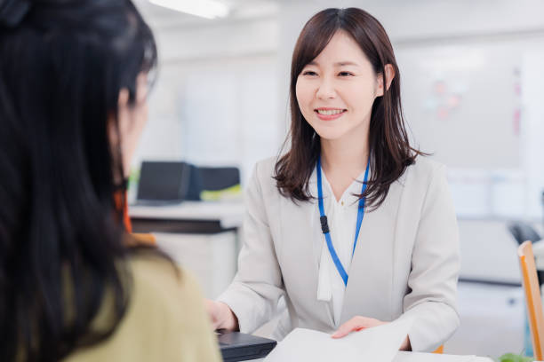 istock A woman at the reception desk 1454809745