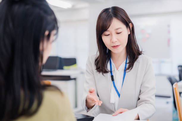 istock A woman at the reception desk 1454809749