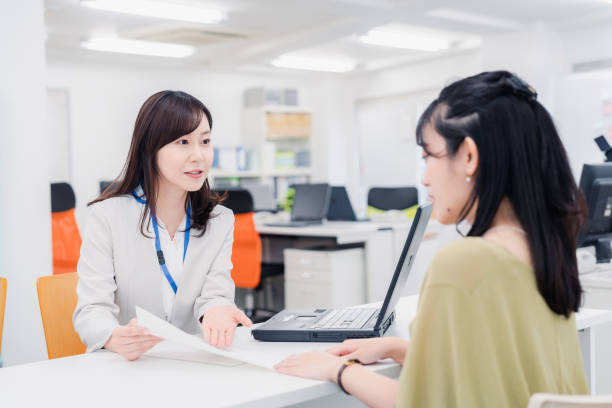 istock A woman at the reception desk 1454809760
