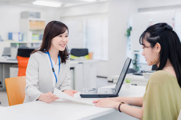 istock A woman at the reception desk 1454809762