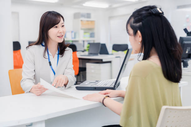 istock A woman at the reception desk 1454809766