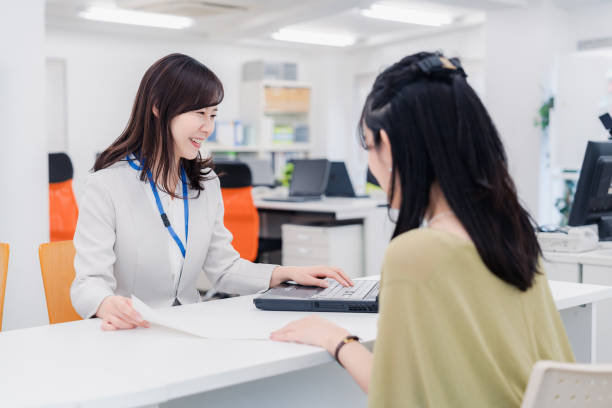 istock A woman at the reception desk 1454809767