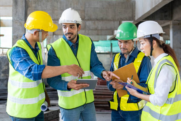 istock team of civil engineers inspect and discuss the construction progress at site 1454810978