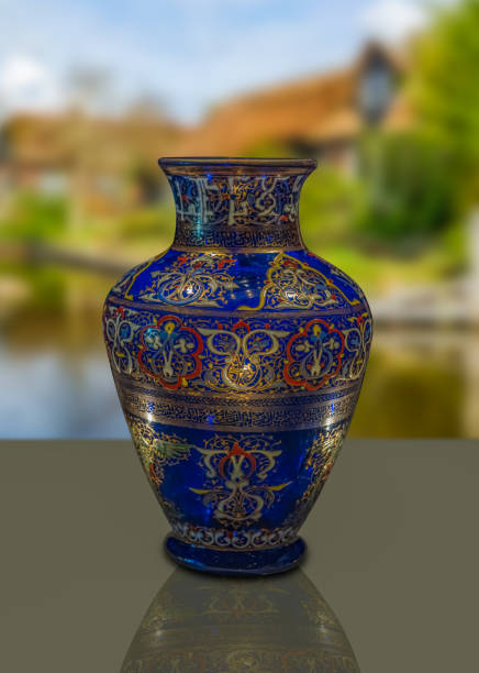 ottoman vase with arabic Calligraphy on a glass table
