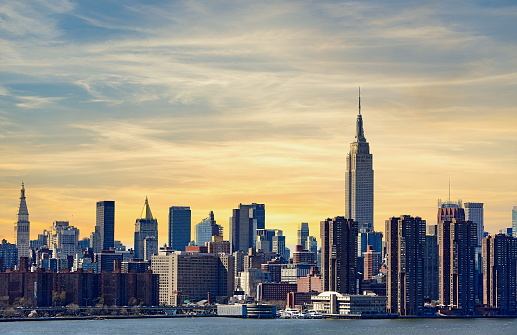 An aerial view of a stunning New York City skyline at sunset, New York, USA