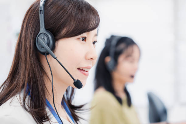 istock A woman responding to a customer at a call center 1454818667