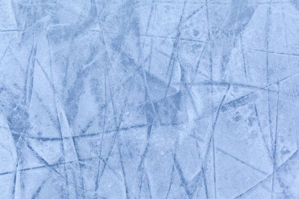 istock Empty ice rink with skate marks after the session outdoor. 1454819862