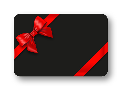 Gift card with red bow and ribbons. Black Friday shopping concept