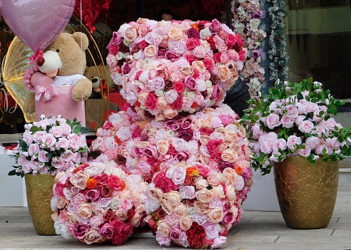 A large teddy bear made of flowers for Saint Valentine’s day