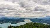 Aerial view of the beautiful Worthersee on a cloudy day in Pyramidenkogel, Carinthia
