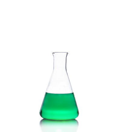 Erlenmeyer Flask filled by green liquid on white background