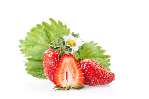Strawberry with blossom isolated on white background